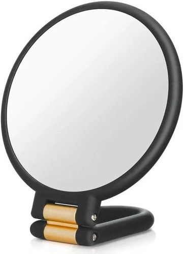 40x magnifying hand - hand, mirror
